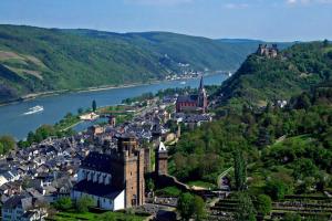 an aerial view of a town next to a river at Kirchhausen in Oberwesel