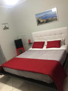 Postel nebo postele na pokoji v ubytování La casetta di Ester