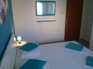 Postel nebo postele na pokoji v ubytování Apartmani PISAC