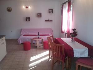 Postel nebo postele na pokoji v ubytování Apartmani PISAC