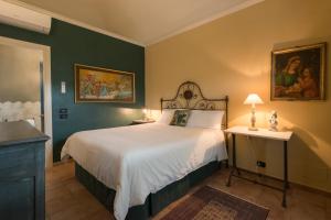 Posteľ alebo postele v izbe v ubytovaní Antico Casale Mattei - Adult only