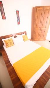 Ein Bett oder Betten in einem Zimmer der Unterkunft ILLIYIN Boutique Hotel
