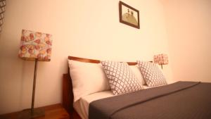 Ein Bett oder Betten in einem Zimmer der Unterkunft ILLIYIN Boutique Hotel