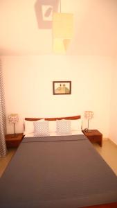 Ein Bett oder Betten in einem Zimmer der Unterkunft ILLIYIN Boutique Hotel