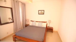 Ein Bett oder Betten in einem Zimmer der Unterkunft ILLIYIN Boutique Hotel