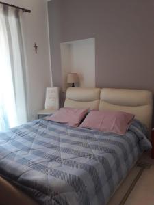 Posteľ alebo postele v izbe v ubytovaní Casa delle Aci
