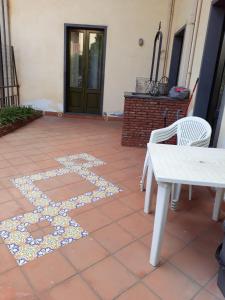 Patio alebo iná vonkajšia časť ubytovania Casa delle Aci