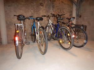 a group of bikes parked in a garage at La Parenthèse in Kaysersberg