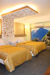 Ένα ή περισσότερα κρεβάτια σε δωμάτιο στο Eurotel Boracay