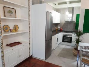 Kuchyň nebo kuchyňský kout v ubytování Apartamento Las Setas