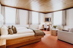 Ein Bett oder Betten in einem Zimmer der Unterkunft Hotel Frauensteiner Hof