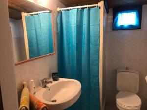 a bathroom with a sink and a toilet and a shower at Fleming 46 in Alghero +42 photos