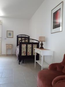 Postel nebo postele na pokoji v ubytování Villa Teseo