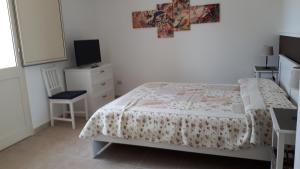 Postel nebo postele na pokoji v ubytování Villa Teseo