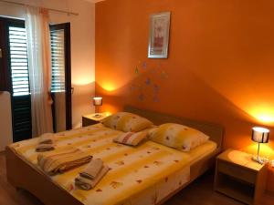Posteľ alebo postele v izbe v ubytovaní Apartment Ruža
