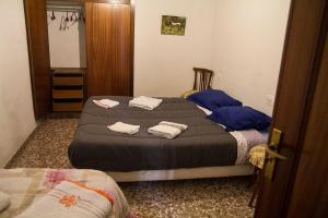 Krevet ili kreveti u jedinici u okviru objekta La Casa 5 de Gandia