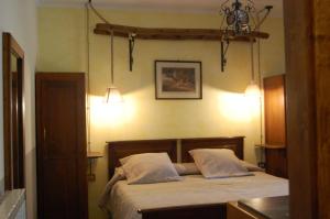 Posteľ alebo postele v izbe v ubytovaní Agriturismo Countryhouse Le Giare + 37 fotografií