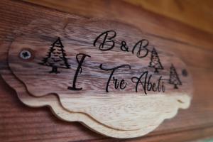 un pedazo de madera con las palabras ser un artista del fuego en I Tre Abeti - Holiday House en Vezzano Ligure