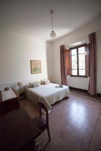 A bed or beds in a room at Villa Rosa de Mar