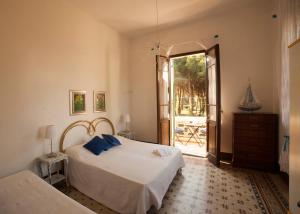 A bed or beds in a room at Villa Rosa de Mar