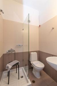 Een badkamer bij Agali Bay Hotel