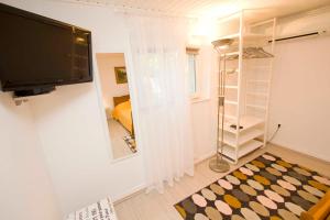 TV a/nebo společenská místnost v ubytování Rooms Beros