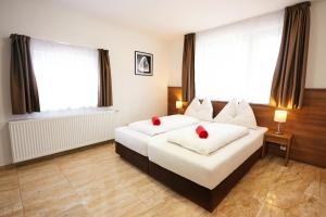 Posteľ alebo postele v izbe v ubytovaní Apartmány Nad Rybníkem