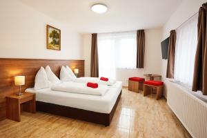 Posteľ alebo postele v izbe v ubytovaní Apartmány Nad Rybníkem