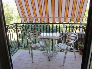 A balcony or terrace at B&B Il Sole Nascente