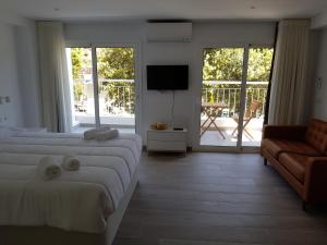 Ένα ή περισσότερα κρεβάτια σε δωμάτιο στο Krm Suite Apartament