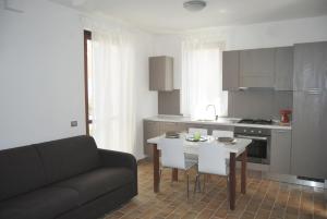 Kuchyň nebo kuchyňský kout v ubytování Adamo ed Eva Resort