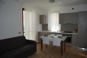 Kuchyň nebo kuchyňský kout v ubytování Adamo ed Eva Resort