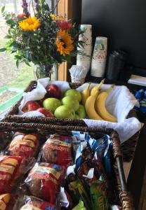 a variety of fruits and vegetables on a table at Chalet Motel in Custer