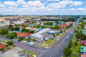 an aerial view of a town with a street at Citigate Motel Newcastle in Newcastle