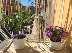 A balcony or terrace at Casa Vacanze Terramare, 550 mt from the beach, close to Ortigia historic center