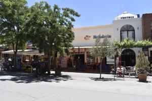 a street scene of a store in a town at Hostal Virgen del Rosario Cafayate in Cafayate