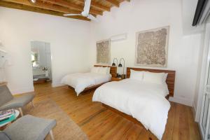 Ibagari Boutique Hotel客房内的一张或多张床位