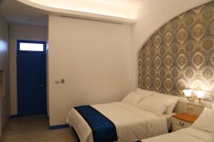 Letto o letti in una camera di Cicada said Greece Homestay