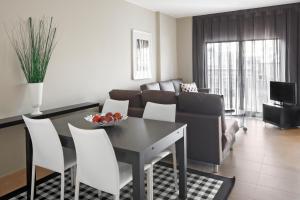 Televízia a/alebo spoločenská miestnosť v ubytovaní Barcelona Apartment Gran de Gràcia