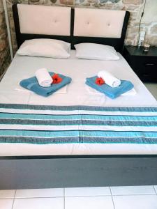 Postel nebo postele na pokoji v ubytování Mariaeva Rooms