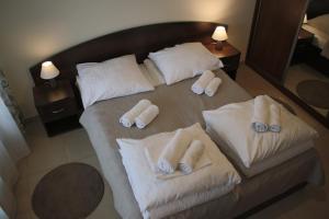 Llit o llits en una habitació de Apartament Kolonialny Olympic Park