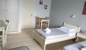 Posteľ alebo postele v izbe v ubytovaní George's Sea View Apartments