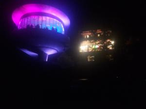 a night view of a building with purple lights at Sevan Writers House in Sevan