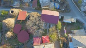 an overhead view of a house with a yard at Hotel Beni in Akhaltsikhe