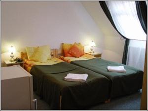 Кровать или кровати в номере Vila Casa Alesiv