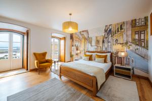 A bed or beds in a room at Varandas de Lisboa - Tejo River Apartments & Rooms