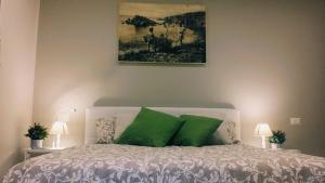 Posteľ alebo postele v izbe v ubytovaní Casa Cleone