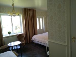 Letto o letti in una camera di Anna´s Bed & Kitchen
