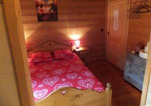 Postel nebo postele na pokoji v ubytování Au Petit Gîte Les Paccots