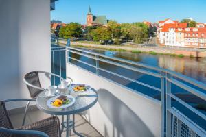 Balkón alebo terasa v ubytovaní Apartamenty Nad Parsętą Szpitalna 7